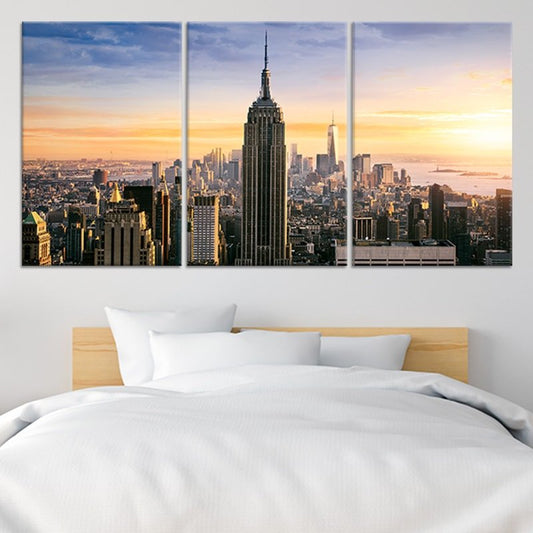 Empire State Building at sunset — modern canvas wall art for living room featuring golden skyline glow and uplifting city elegance.