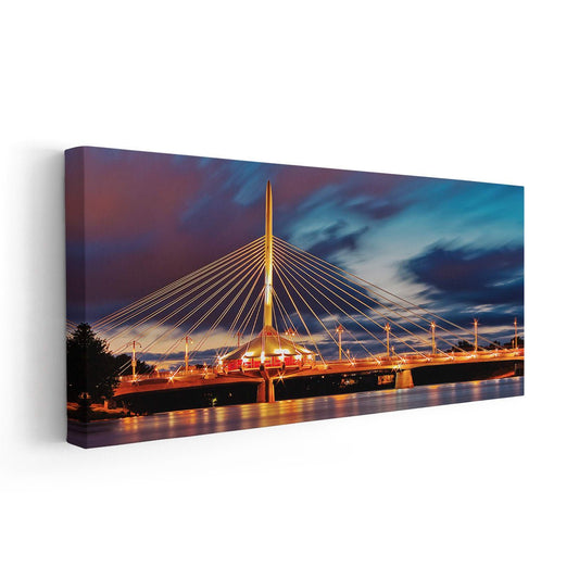 Winnipeg skyline and Esplanade Riel Bridge — modern canvas wall art with deep blue palette, ideal for urban home decor or office.
