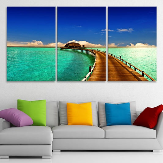 Wooden pier leading to island — coastal canvas print in vibrant blue tones, calming beach wall art for bedroom or seaside retreat