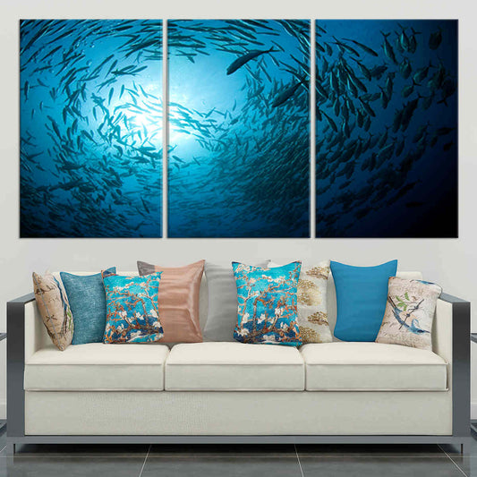School of fish swimming in circles — modern canvas wall art for living room, peaceful ocean-inspired décor with calming blue tones.