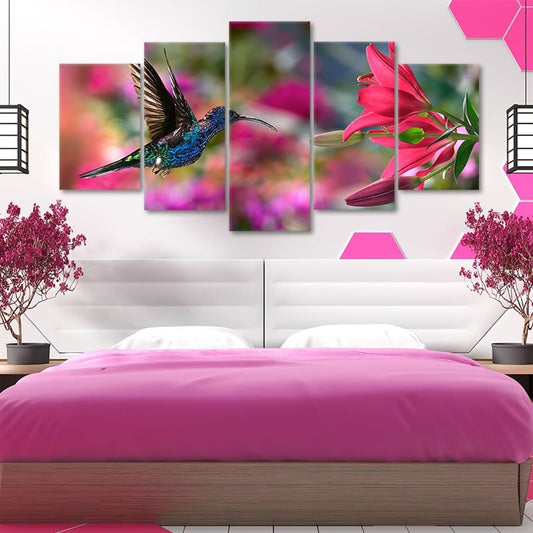 Vibrant hummingbird in flight — modern canvas wall art, bright pink floral background perfect for uplifting bedroom or office décor.