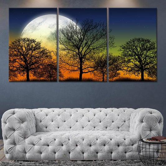 Moonlit tree silhouettes over sunset sky Large canvas art adding a peaceful bedroom mood with warm twilight colors and relaxing nighttime charm