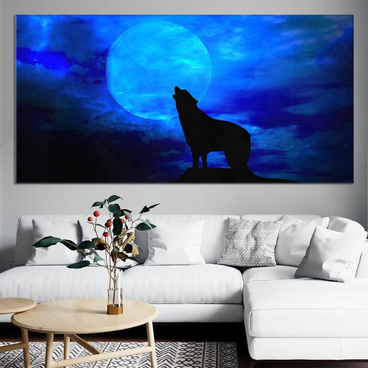 Wolf howling at moon — large canvas wall art for living room, evoking mystery and wilderness in a modern blue night scene.