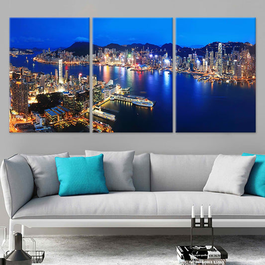 Hong Kong skyline at night — large canvas wall art for living room, glowing harbor reflections create a calm and modern atmosphere