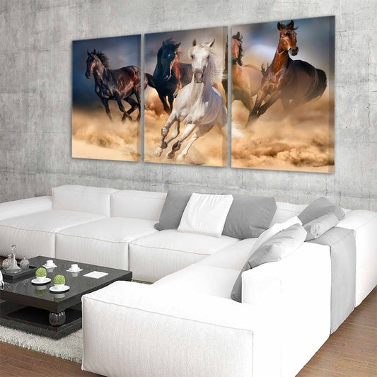 Running stallions in motion — modern canvas wall art, dynamic movement and soft light adding inspiration to bedroom interiors.
