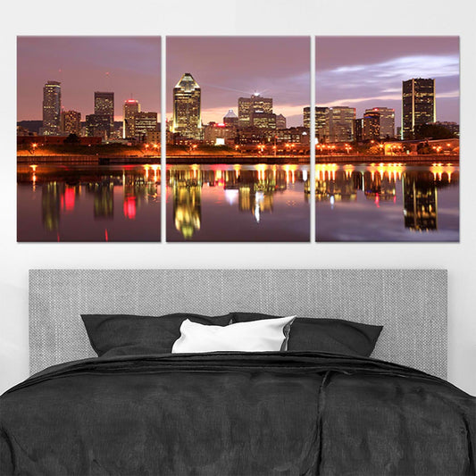 Montreal skyline at dusk — large canvas wall art in warm amber tones with city reflections, elegant statement piece for living room decor.