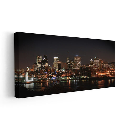 Nighttime Montreal cityscape — modern canvas wall art in warm amber hues, peaceful and inspiring addition to a cozy bedroom wall.