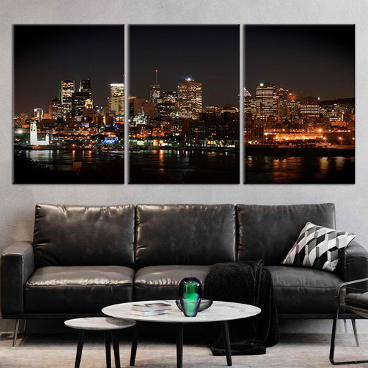 Montreal skyline at night — large canvas wall art in golden city lights reflecting on water, elegant centerpiece for living room decor.