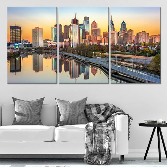 Downtown Philadelphia cityscape at sunset — large canvas wall art for bedroom adding warm and calming urban sophistication.