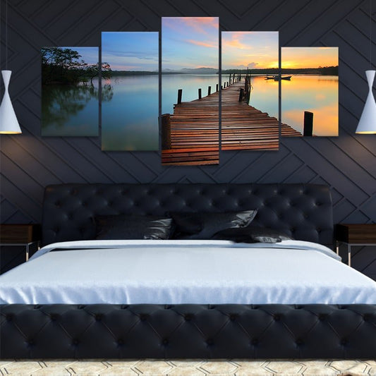 Sunset lakeside pier — Large canvas art in warm golden hues enhancing bedroom décor with a serene atmosphere ideal for quiet and cozy relaxation