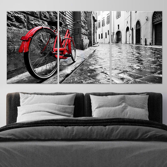Retro red bicycle on cobblestone street large canvas wall art for living room adds nostalgic charm and timeless city vibe.