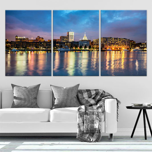 Savannah Georgia skyline at night — large canvas wall art with golden lights and calm reflections, perfect for living room decor.