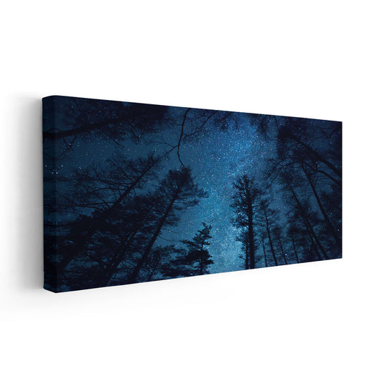 Starry forest horizon — Large canvas art in a modern dark-blue palette enhancing living room décor with a peaceful and immersive nighttime mood