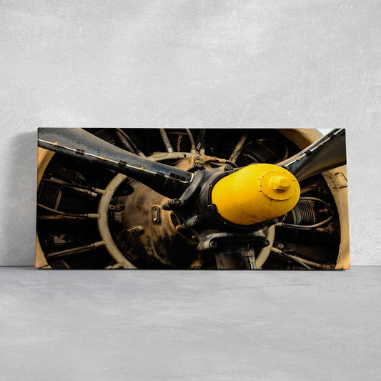 Propeller aircraft engine close-up — large canvas wall art showcasing metallic texture, ideal for office or aviation gallery walls.