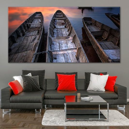Wooden fishing canoes resting on calm water canvas wall art for living room wall art, peaceful lake scene with rustic charm