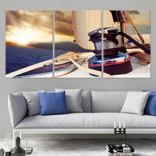 Sunset sailboat scene canvas wall art for living room décor, adding calming nautical warmth through golden ocean tones for coastal homes