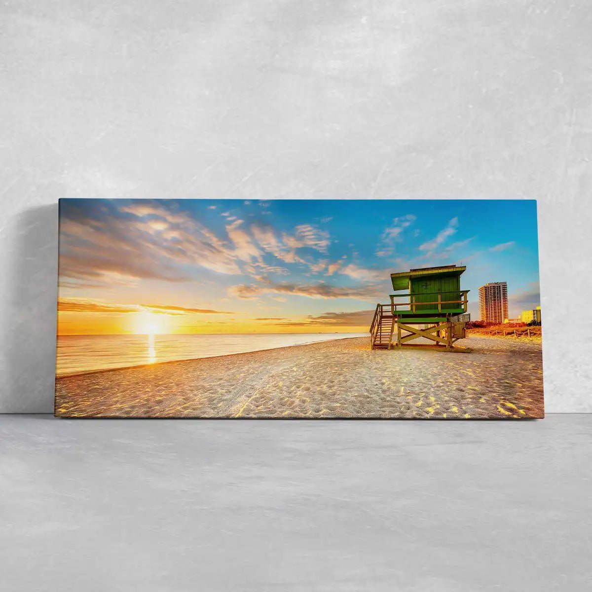 framed Beach sunrise wall art print featuring a lifeguard tower on the shore at dawn.