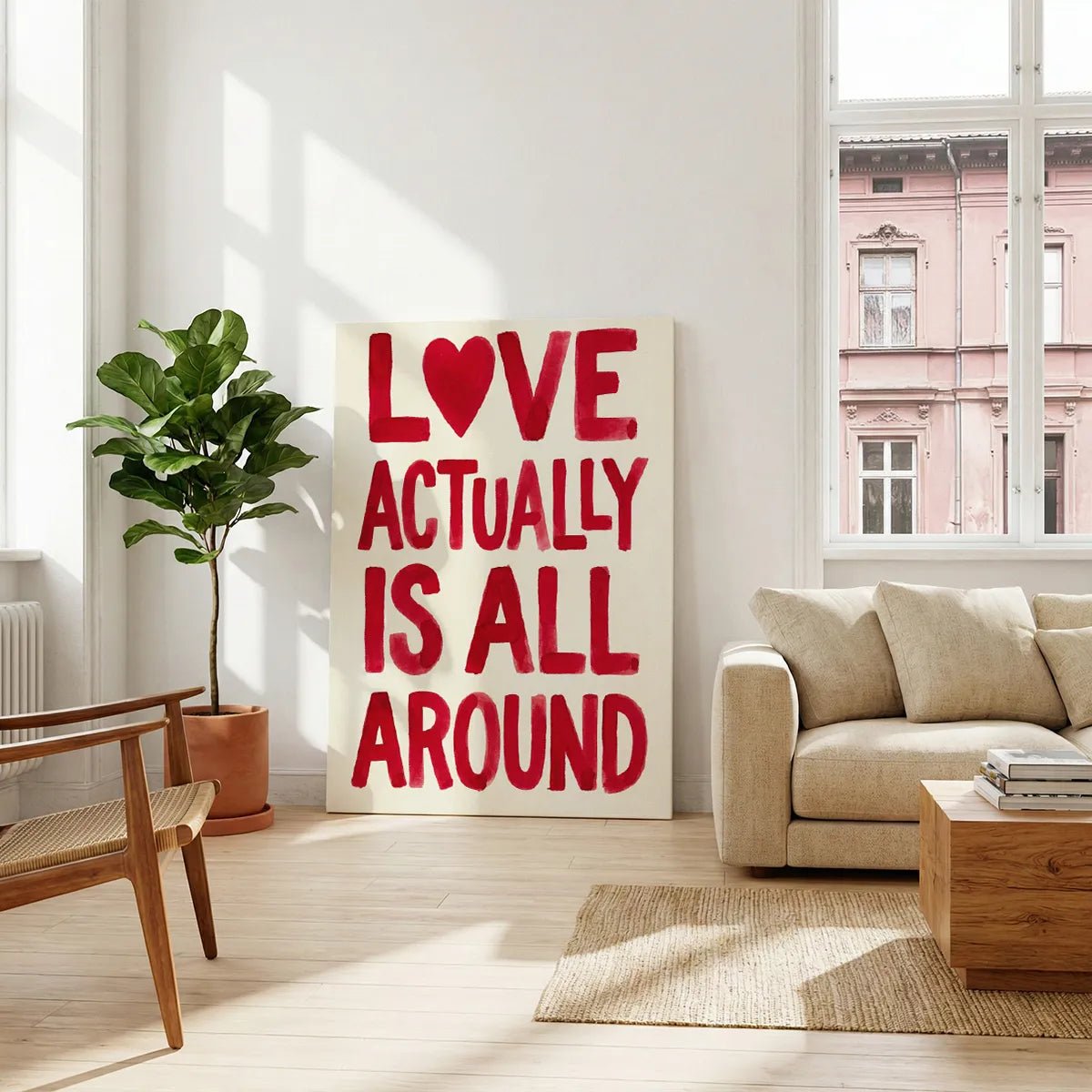 Modern canvas art featuring warm and affectionate typography, with a heart replacing the 'O' in 'LOVE' on a white canvas.