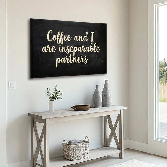 Horizontal canvas wall art with centered handwritten-style quote on a solid black background