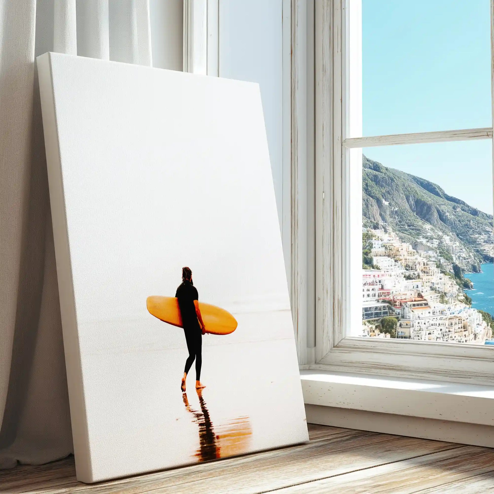Surfer walking at shoreline captured in canvas print with minimalist style