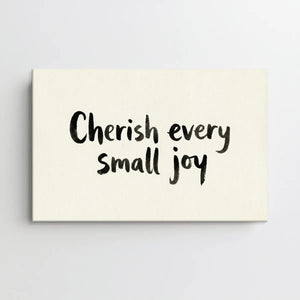 Simple canvas wall art with brush-style lettering and a centered inspirational quote on a plain background