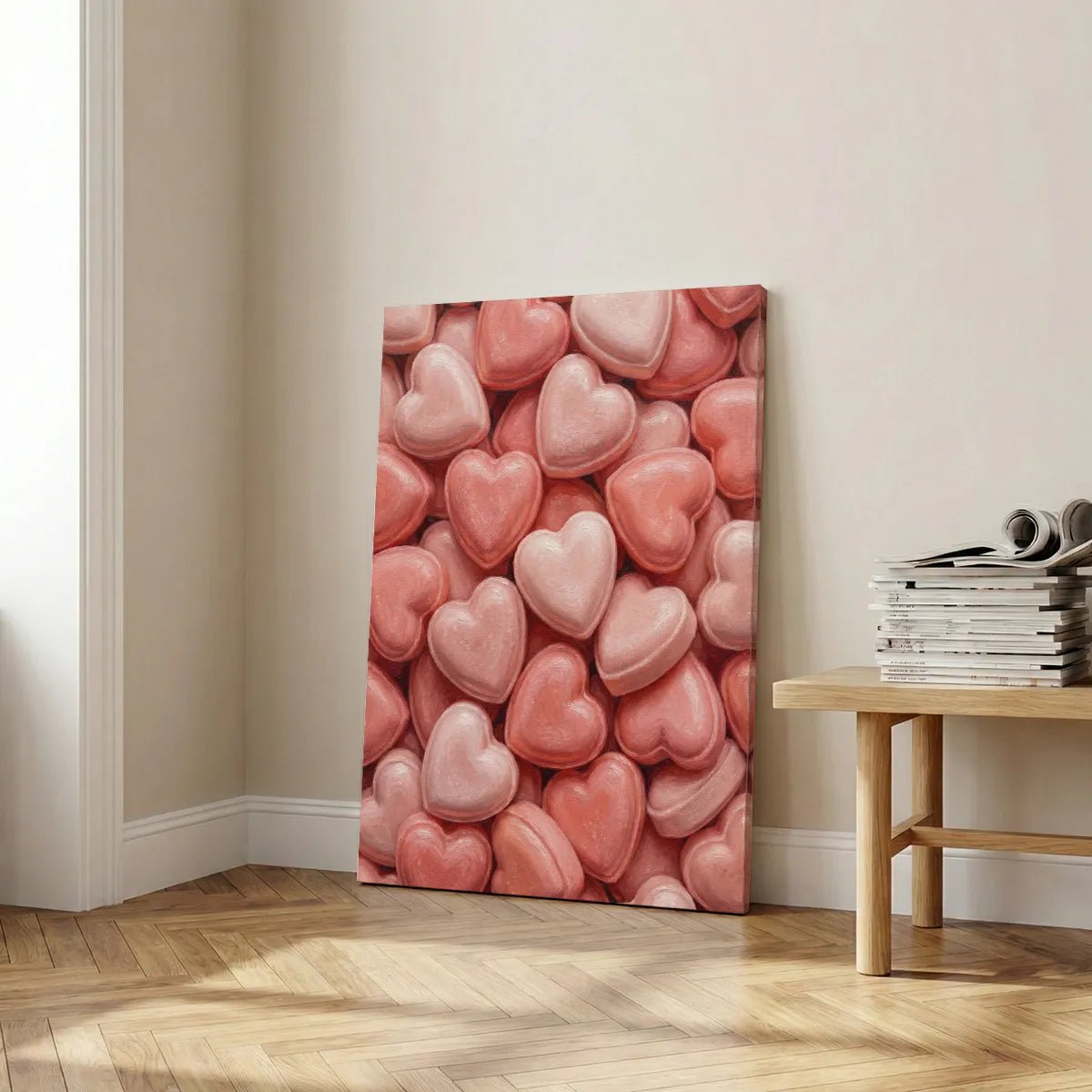 Romantic-themed canvas wall decor filled with stylized candy-like hearts in pink and red, creating a lighthearted mood.