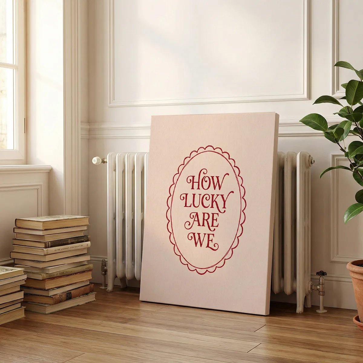 Fine art canvas with minimalist design, featuring warm red words in a scalloped frame against a calm beige tone