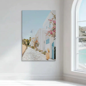 Soft blue and white village wall art bringing bright coastal charm