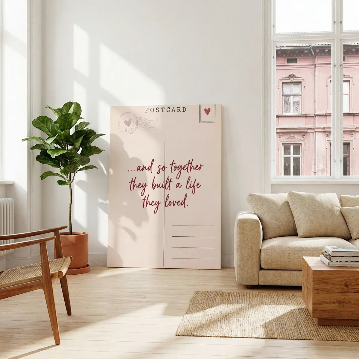 Decorative canvas print with a clean, romantic design, including a heart icon and vintage stamp on a cream backdrop.