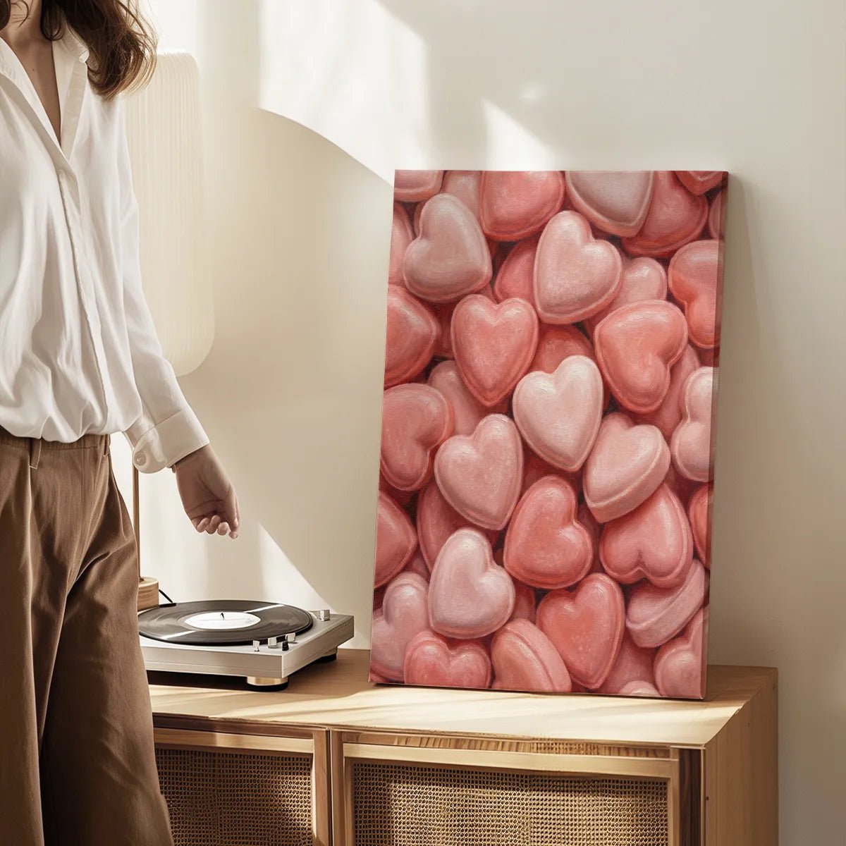 Canvas wall art print with a dense pattern of candy-like hearts in romantic tones, perfect for cozy, feminine decor.