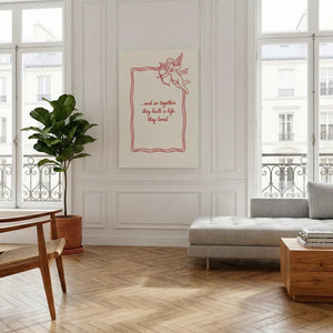 Fine art canvas with vintage-inspired line drawing of cupid and romantic phrase framed by a wavy border.