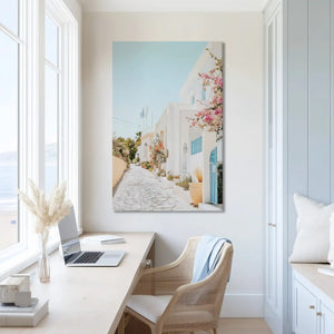 Pastel toned coastal village canvas print adding warmth to bright spaces