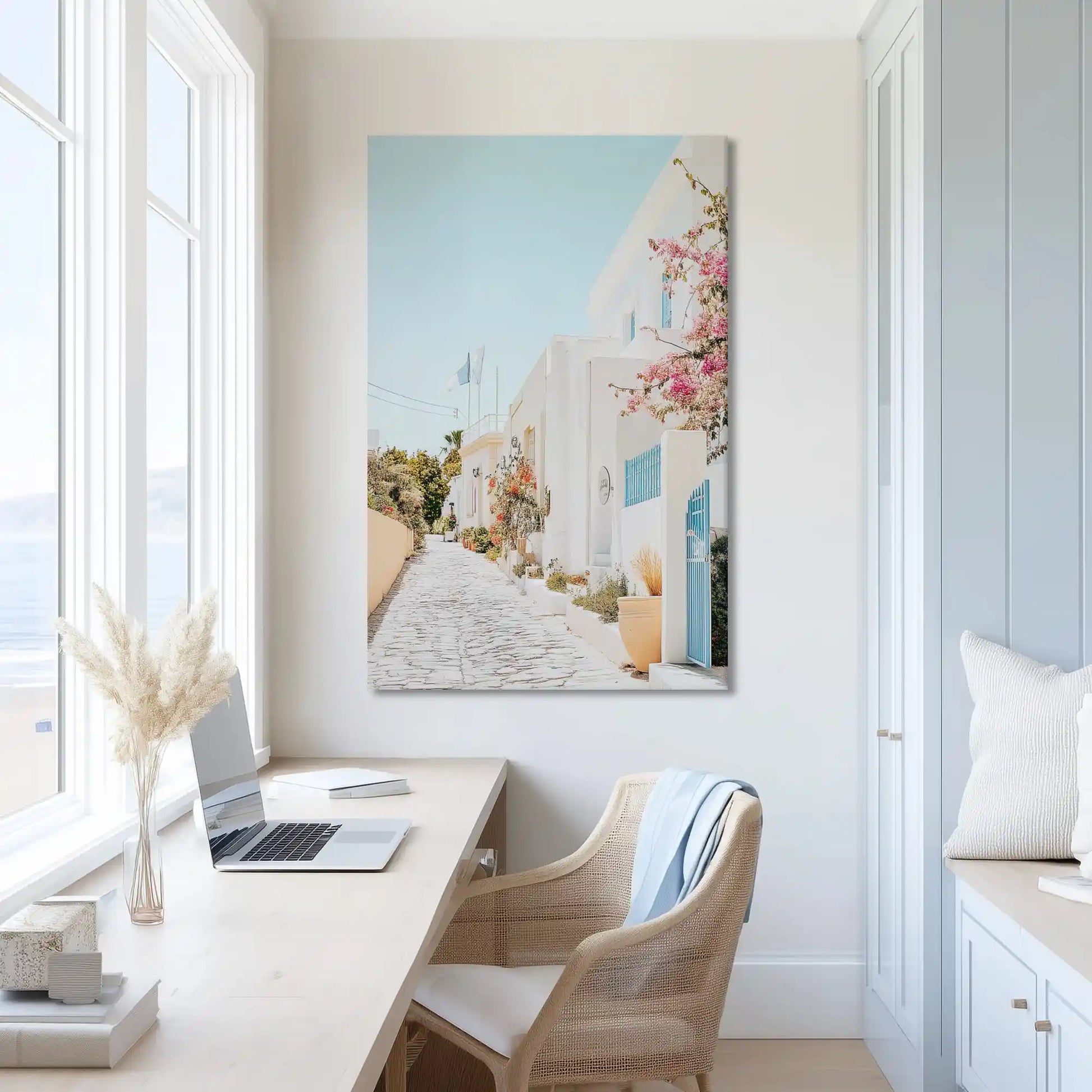 Pastel toned coastal village canvas print adding warmth to bright spaces