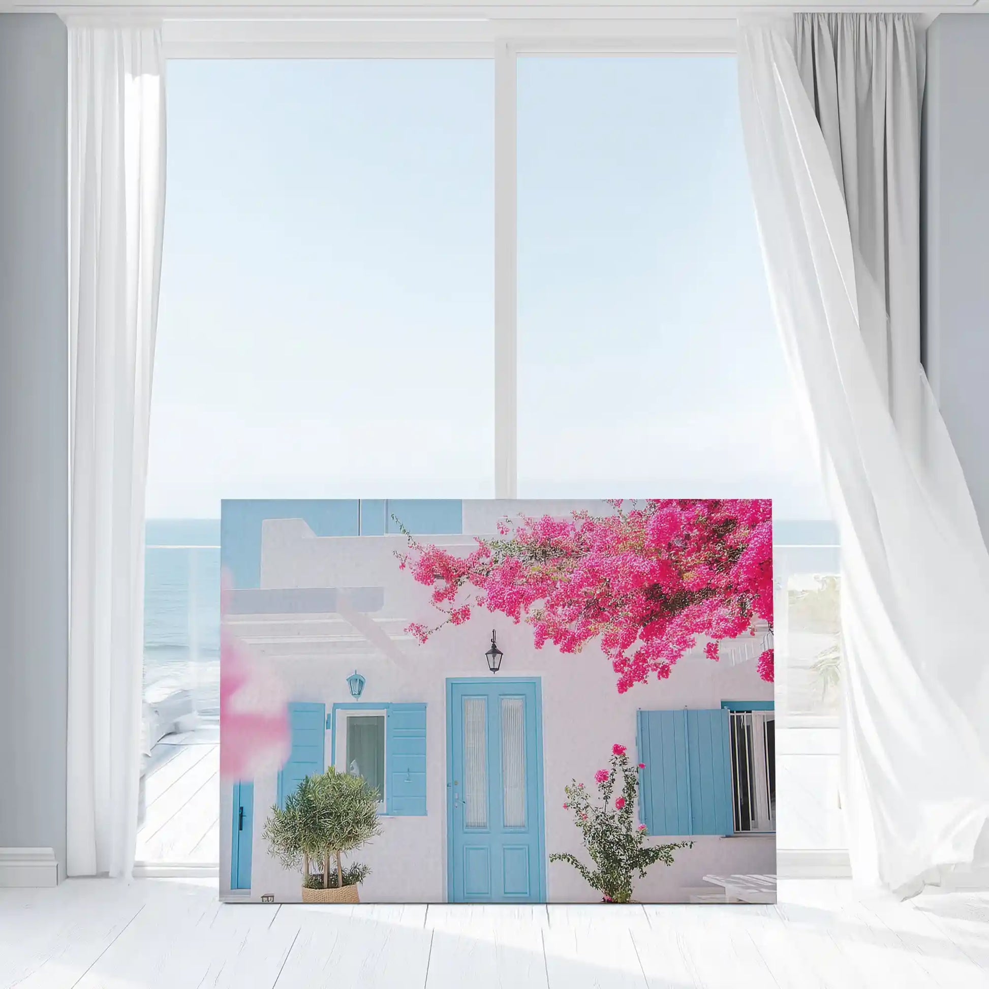 Mediterranean canvas wall art with rustic seaside architecture and bright floral design