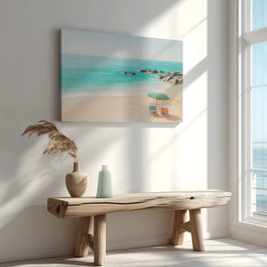 Serene sandy shore with striped umbrella captured in canvas print with modern style