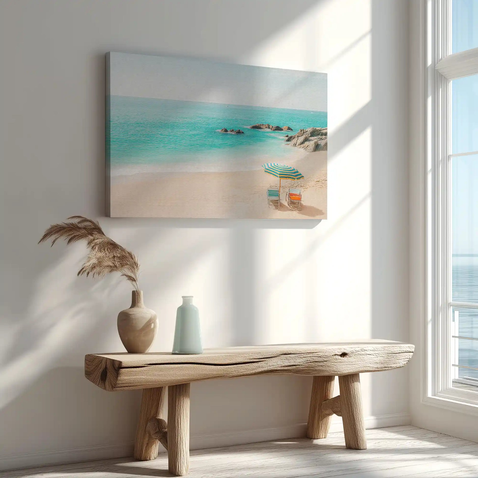 Serene sandy shore with striped umbrella captured in canvas print with modern style