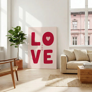 Decorative canvas print with bold LOVE text and YOU integrated vertically, using a limited red and pink palette