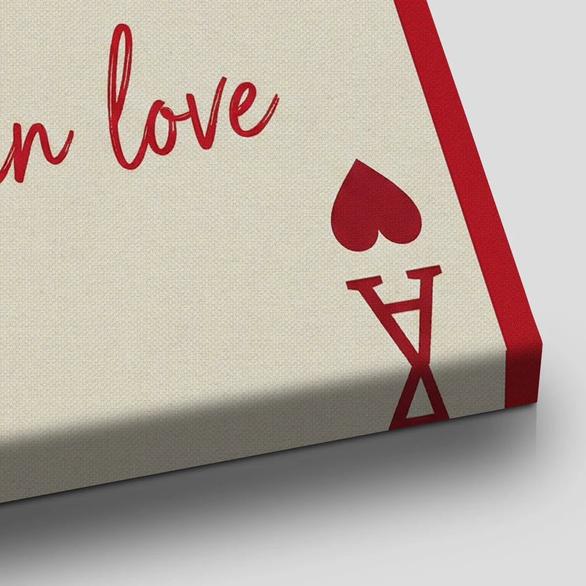 Modern canvas art with a symmetrical pop art design, showcasing a heart motif and romantic message in a bold red palette.