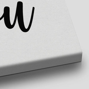 Modern canvas art with a bold black heart and handwritten text, designed in a flat, affectionate style for minimalist interiors