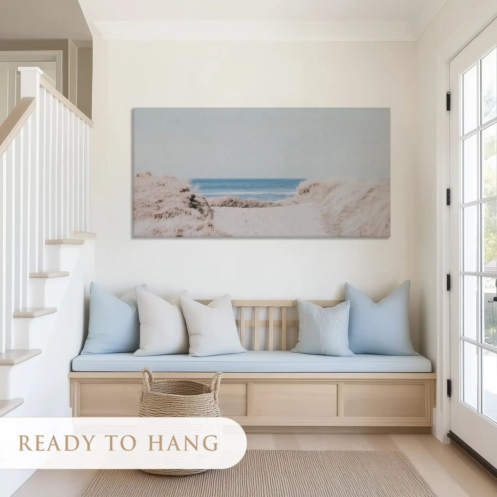 Calm coastal landscape canvas art with light tones for serene living room setting