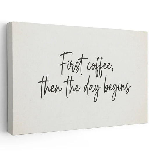 Canvas wall art featuring the handwritten-style quote 'First coffee, then the day begins' on an off-white background