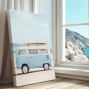 Classic surf van by the ocean captured in a coastal canvas print with minimalist style