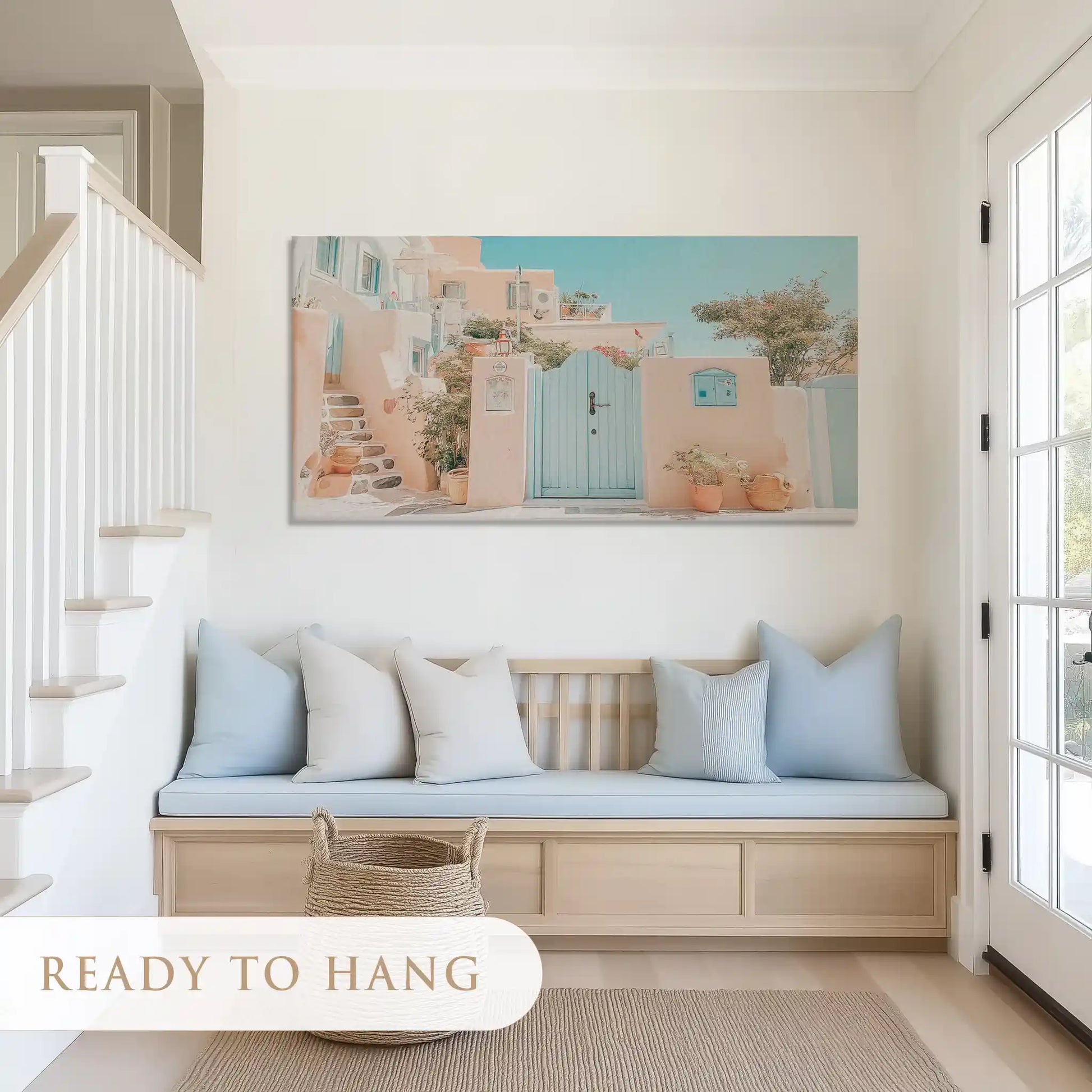 Coastal wall art on canvas with warm pastel tones and village-style seaside architecture