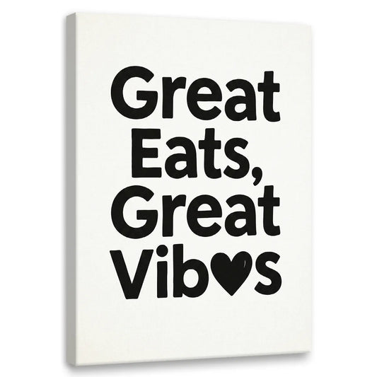Minimalist canvas wall art featuring bold black text 'Great Eats, Great Vib♥s' on white background with a heart symbol in 'Vibes'.