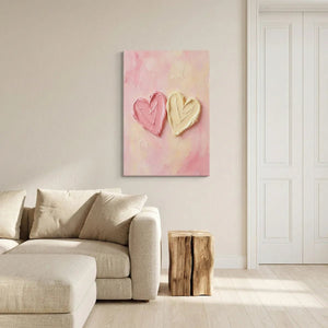 Fine art canvas featuring sculptural heart forms in pink and cream, set against a warm, softly blended background.