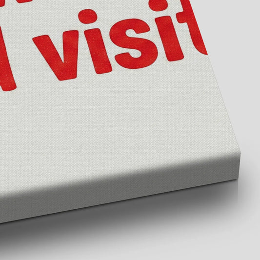 Bold canvas wall art with playful red typography and five red stars arched above centered quote on a white backdrop