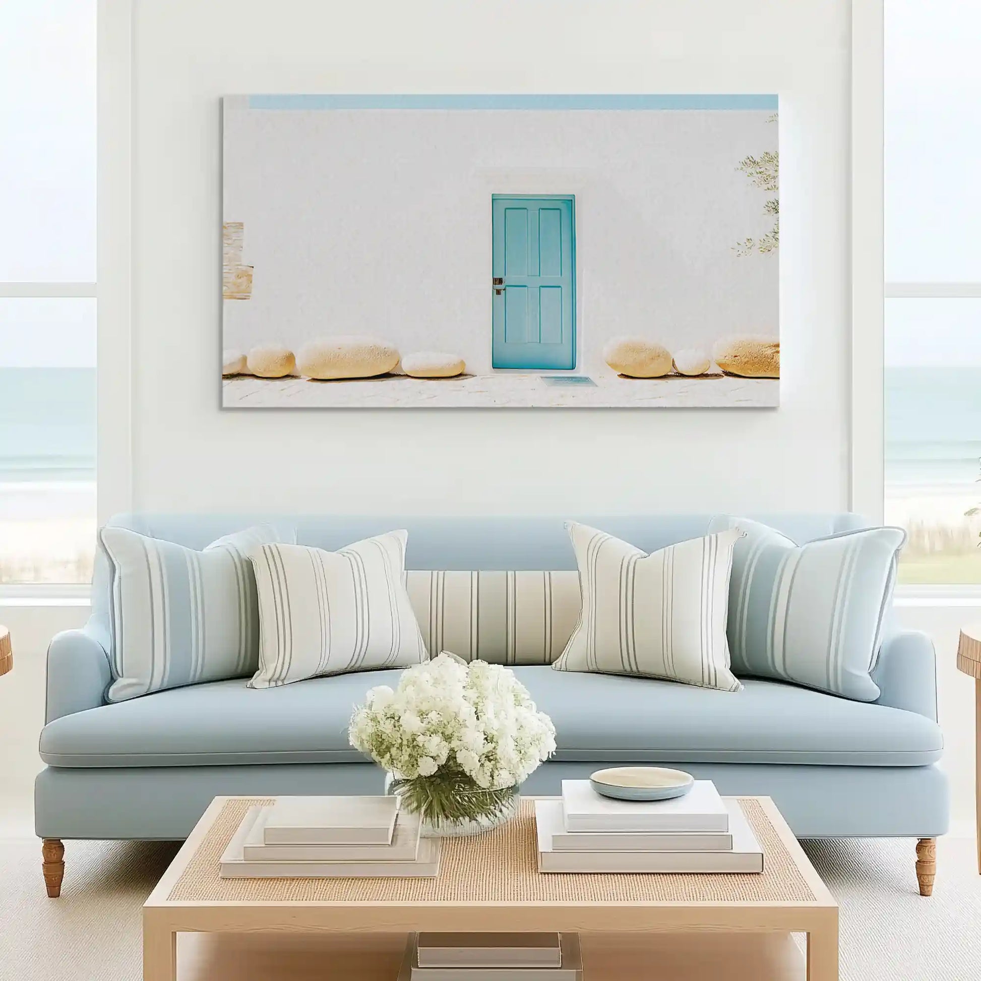 Contemporary coastal wall art canvas with clean white wall and pastel turquoise accents