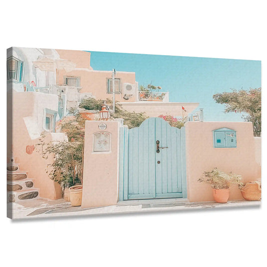 Coastal canvas wall art of pastel Mediterranean houses with aqua doors and terracotta walls