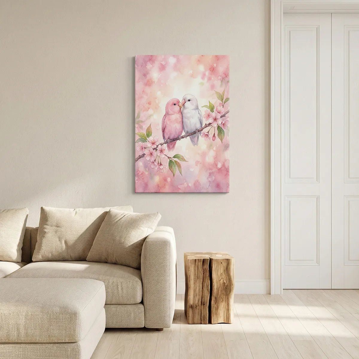 Delicate canvas wall art showing a pair of birds perched closely among pastel cherry blossoms and green leaves in a dreamy setting.