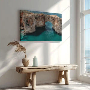 Sunlit archway over turquoise sea captured in canvas print with minimalist coastal style